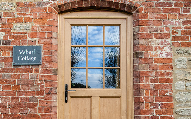 Timber Effect Front Door with Bespoke Glazing